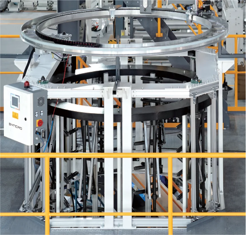 Motorised bubble cage on the platform, its ring of carbon fibre rollers open, control box on the left post